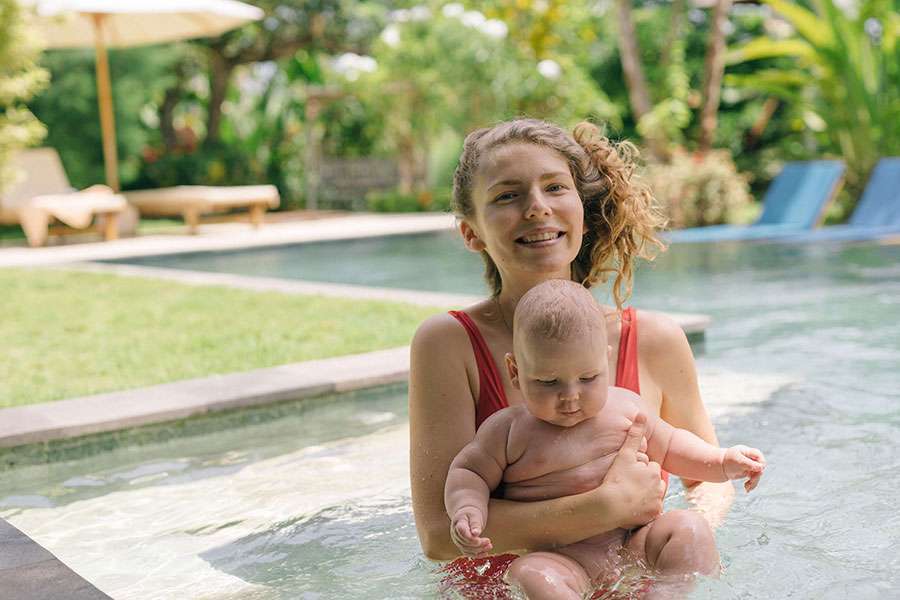 Mom-and-son-swimming-in-the-pool